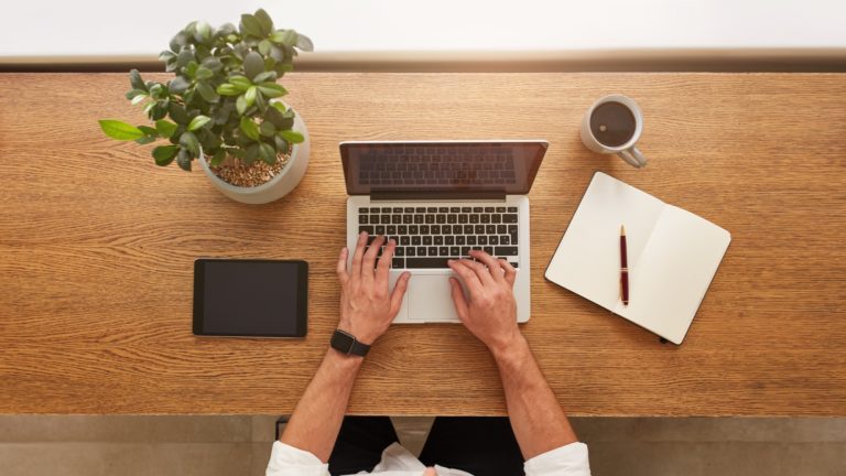 Man working on laptop from home